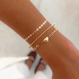 Złota bransoletka sztywna Capri z kuleczek diamentowanych próby 585
